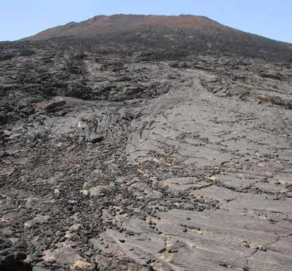 Lava flow below a volcanic cone